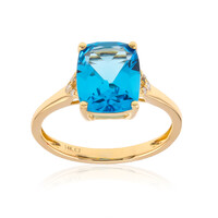 Anillo en oro con Topacio azul suizo