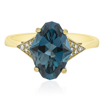 Anillo en oro con Topacio azul de Londres