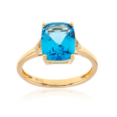 Anillo en oro con Topacio azul suizo