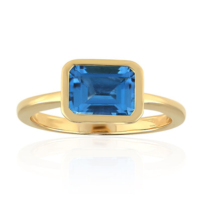 Anillo en oro con Topacio azul suizo (Adela Gold)